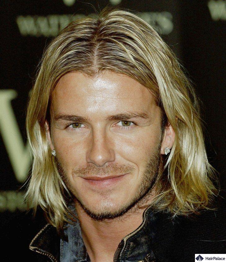 David Beckham frequently experimented with long hair
