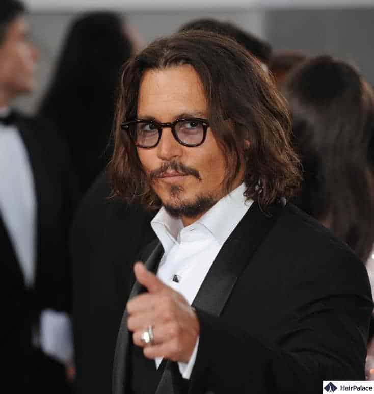 Johnny Depp is perhaps the most controversial entry on our list of male celebrities with long hair