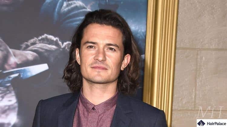 Orlando Bloom is another entry on our list of male celebrities with long hair