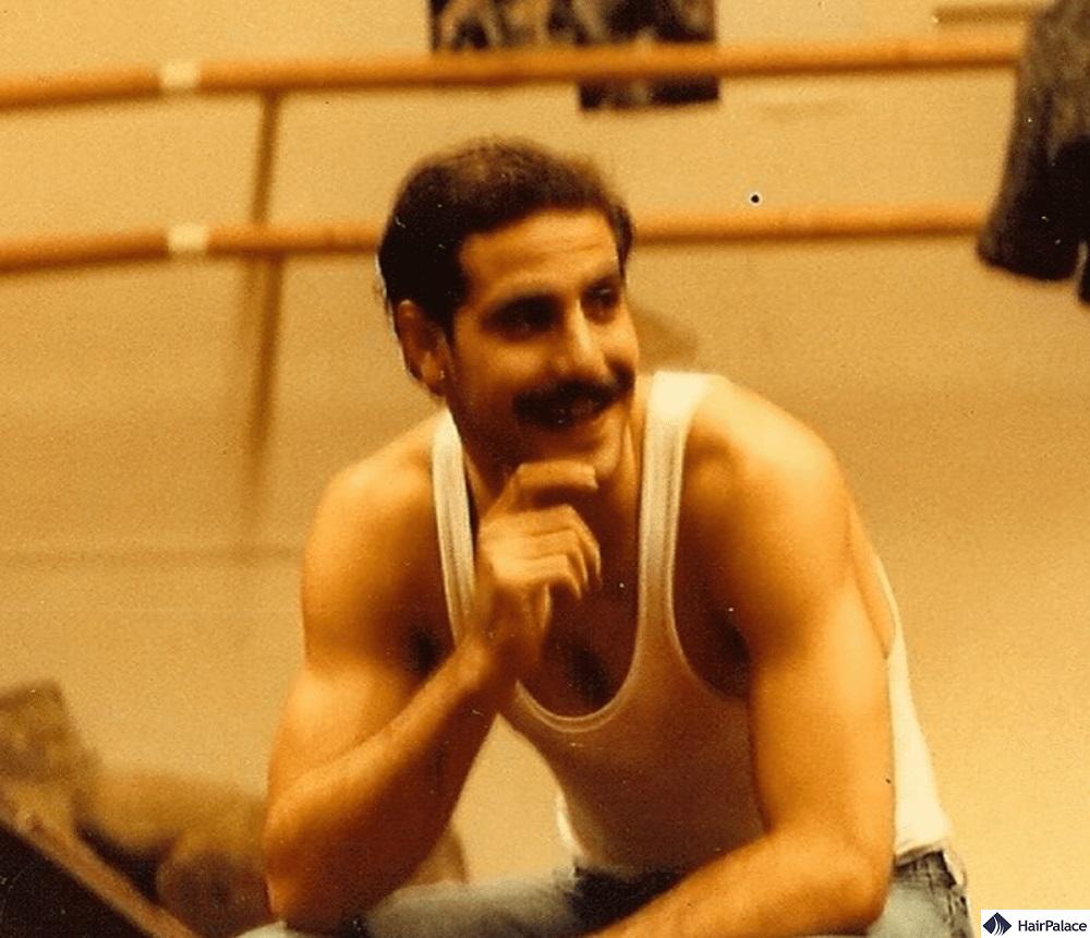 stanley tucci with hair at the state university of new york